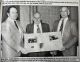 Ross, Bing presented with plaque from Renfrew County Milk Producers