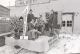 SPORTS-WHITEWATER REGION SOFTBALL TEAMS - Toney's Tigers float in Cobden Carnival, 1975 l-r: Kelly Dunn, Lloyd Dunn, Jim Dunn, Elmer MacLaren & Donnie Rathwell (Roy Lester building in background)